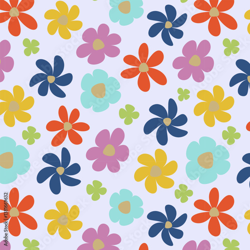 A bright and cheerful floral pattern on a light background. The composition features a variety of large flowers in shades of blue, pink, orange and yellow, as well as small clover leaves. This