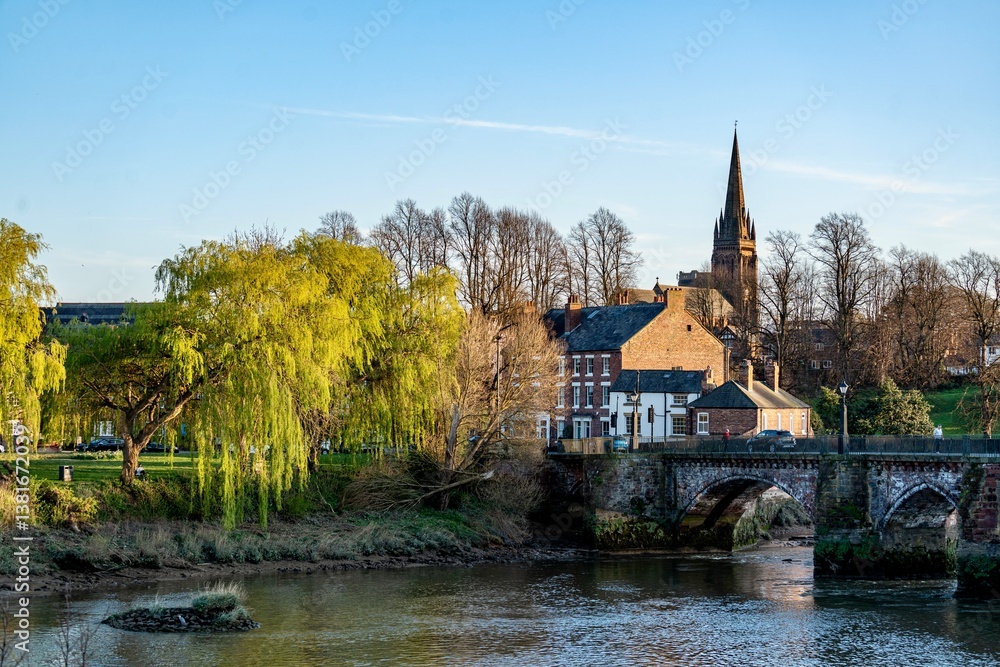 The view of the city of Chester, England as seen from the City Wall that surrounds the interior of the city. The city wall was constructed during the 1st - 3rd centuries