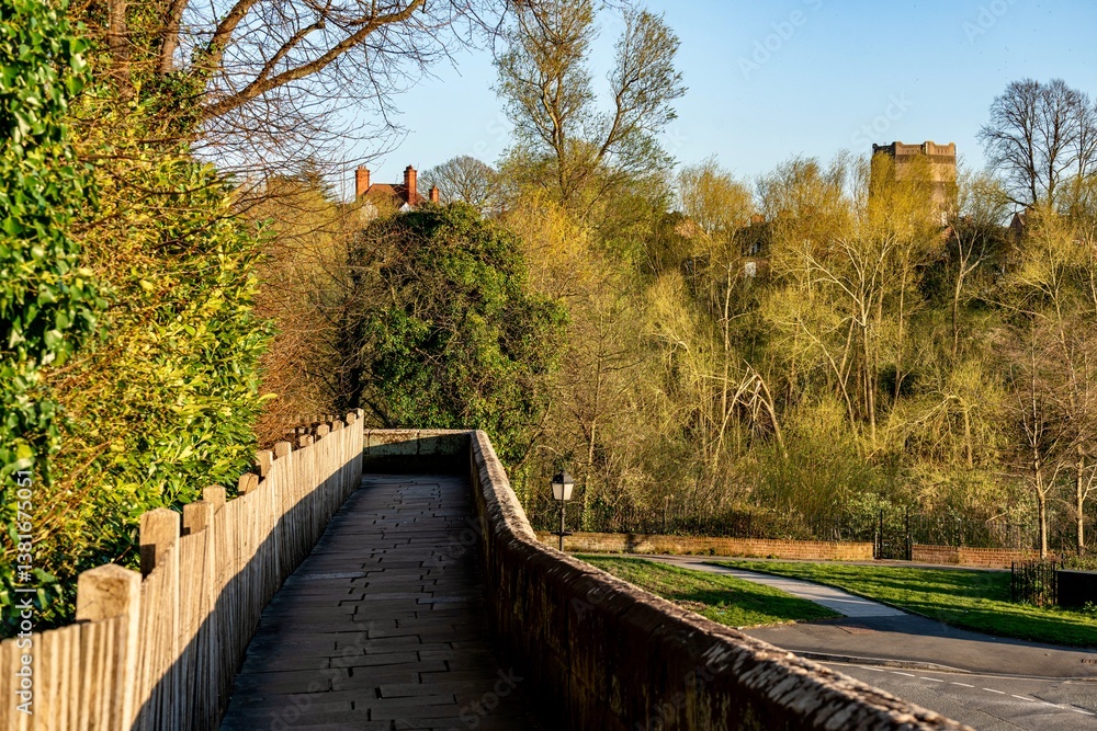 The view of the city of Chester, England as seen from the City Wall that surrounds the interior of the city. The city wall was constructed during the 1st - 3rd centuries