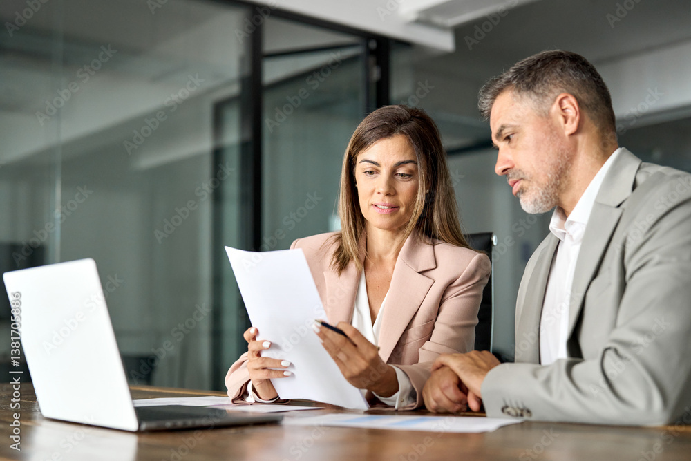 Business woman lawyer manager holding legal documents consulting mature older client at office meeting, two professional executives experts discussing financial accounting papers working together. Business woman lawyer manager holding legal documents consulting mature older client at office meeting, two professional executives experts discussing financial accounting papers working together.