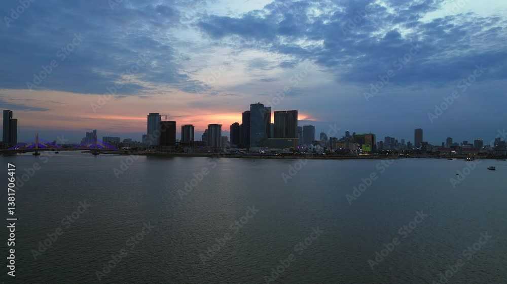 Cambodia City sunset skyline on Mekong River. Perfect aerial view flight drone Cambodia City sunset skyline on Mekong River. Perfect aerial view flight drone