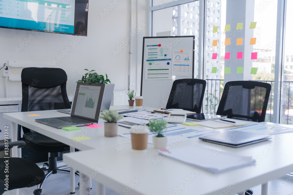Modern Open Office Workspace with Data Charts Modern Open Office Workspace with Data Charts