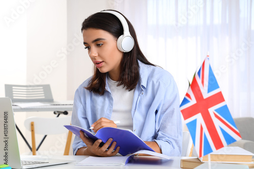 Young woman in headphones l...
