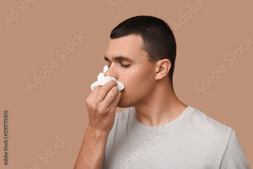 Ill young man with tissue b...