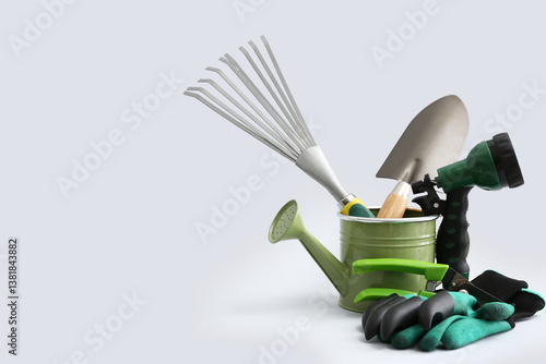 Different gardening tools on white background