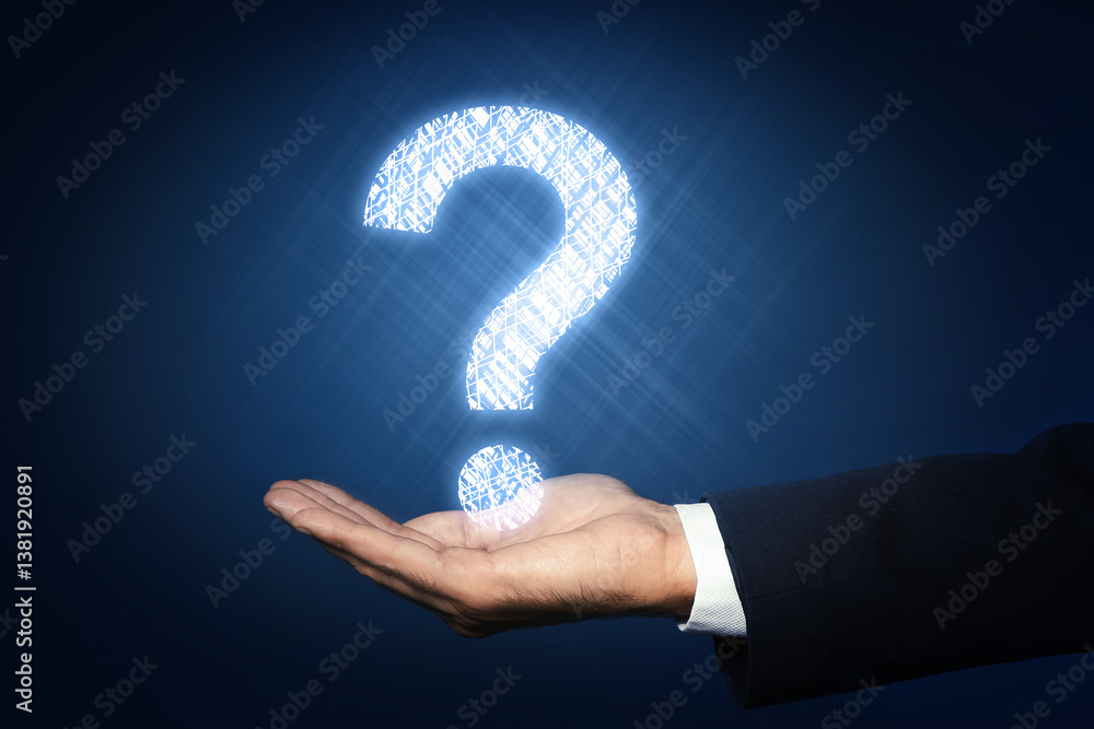 Businessman holding virtual question mark on dark background, closeup Businessman holding virtual question mark on dark background, closeup