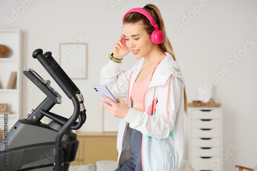 Young woman with pink headp...