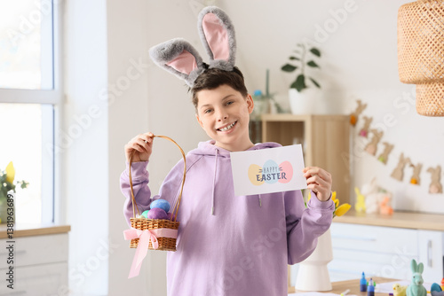 Teenage boy with Easter egg...