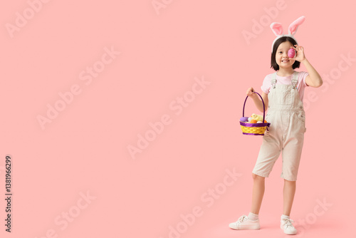 Cute Asian girl in bunny ea...