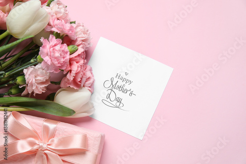 Obraz na płótnie Bouquet of different beautiful flowers with greeting card and gift box on pink background. Mother's Day celebration w salonie