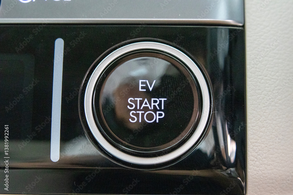 EV start stop button inside a car,