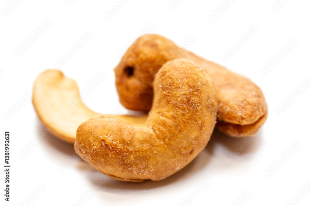 Roasted cashew nuts on white background