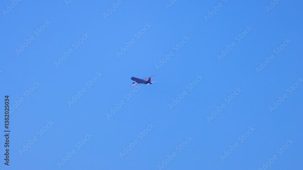 Airplane Flying Over Geelong's Clear Blue Sky Airplane Flying Over Geelong's Clear Blue Sky
