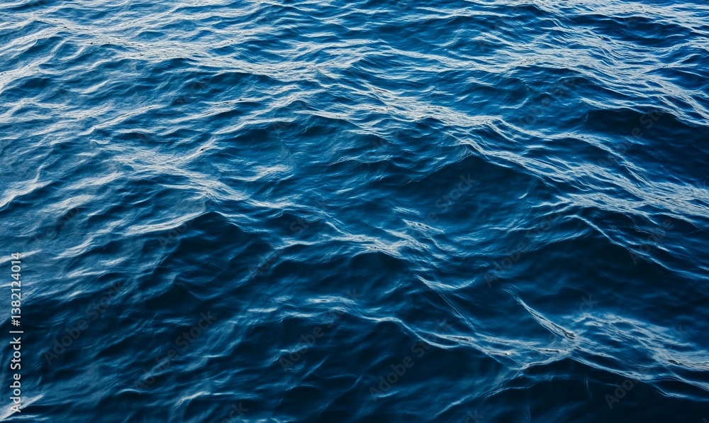 Obraz premium Deep blue ocean water with gentle waves