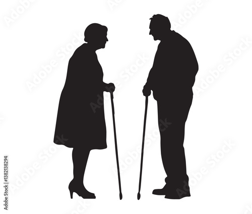 Silhouette of a senior couple. Elderly couple silhouette – senior citizens with walking canes.