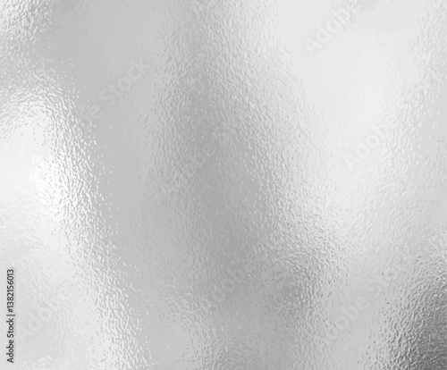 Close-up view of a frosted or brushed metallic surface with a subtle texture and light reflection. Ideal for use in design backgrounds, packaging, or industrial-themed mockups.