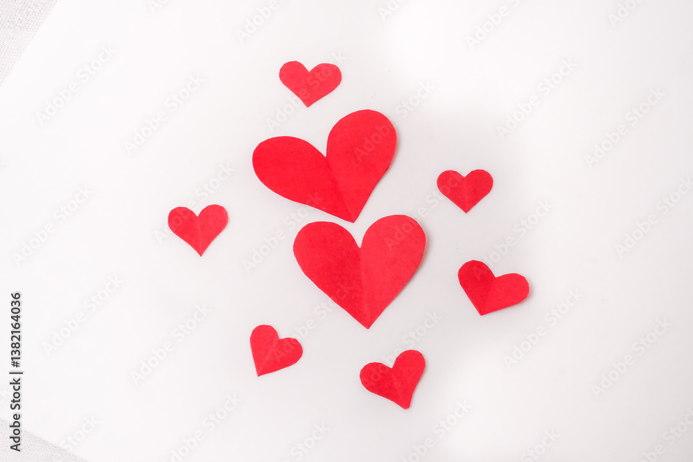 Red paper hearts isolated on white background, paper art copy space for text Red paper hearts isolated on white background, paper art copy space for text