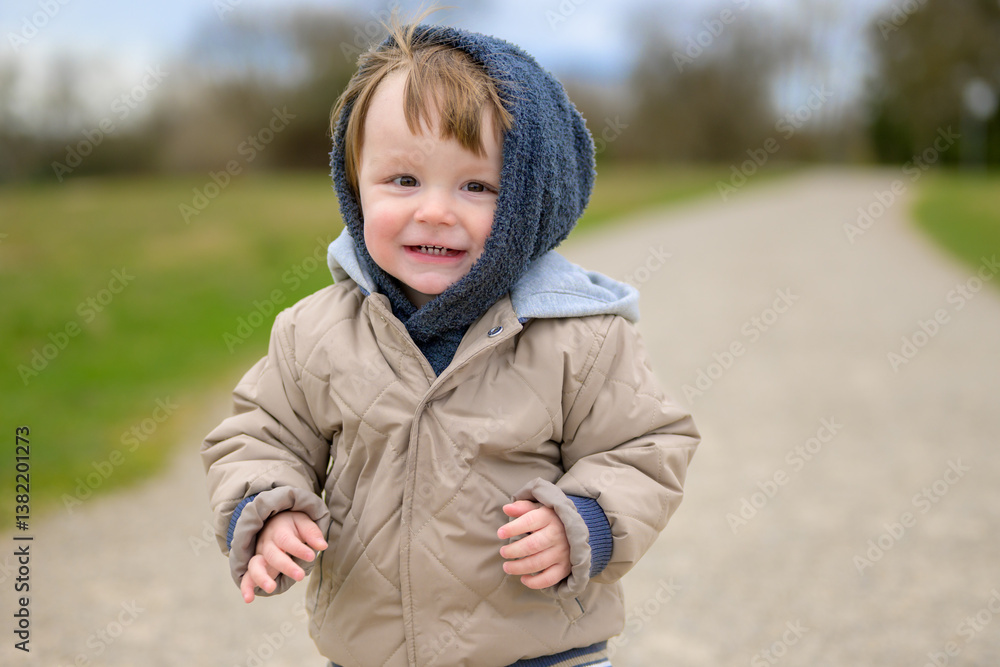 Smiling Boy On Walking Path