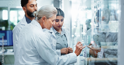 Fotografie Glass wall, science and people in lab, research and collaboration for experiment