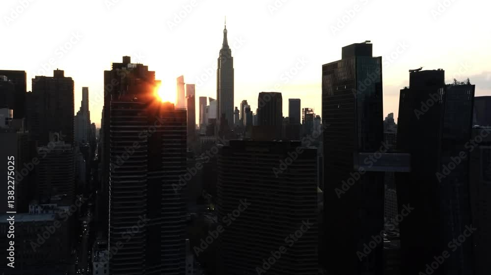 Skyline of Lower Manhattan, silhouetted against the sky at sunset. Aerial footage with the panning camera motion. 4K Skyline of Lower Manhattan, silhouetted against the sky at sunset. Aerial footage with the panning camera motion. 4K