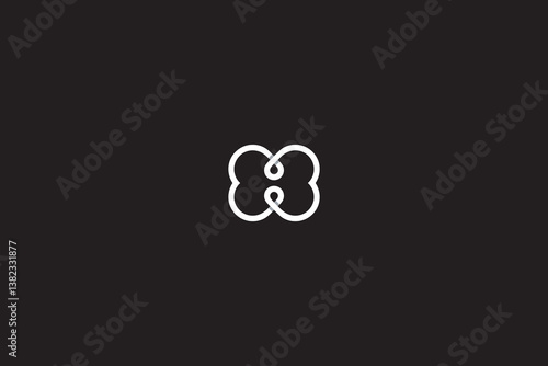 Abstract Swirl Letter BB or MW Butterfly Monogram isolated on black background. 
