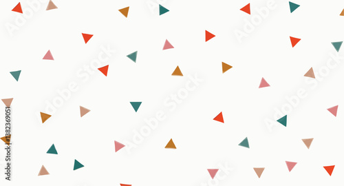 scattered colorful triangles on white background