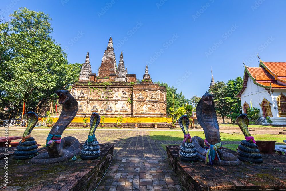 Wat Chet Yot or Wat Photharam Maha Wihan, seven pagoda temple It is a major tourist attraction in Chiang Mai, Thailand.with evening,Temple in Chiang Mai.