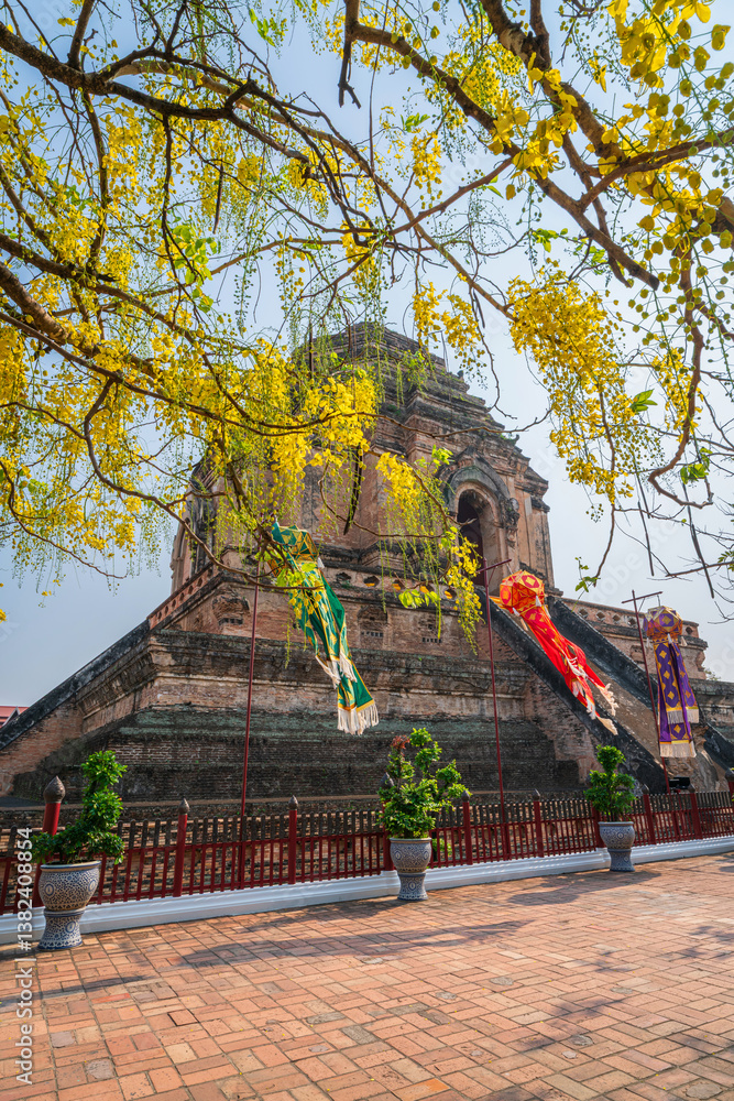 Lanna lantern and Prayer flags tung Hang or Northern traditional flag hang on sand pagoda in the Wat Chedi Luang temple for Songkran Festival is celebrated in a traditional New Year's Day in Chiang Ma