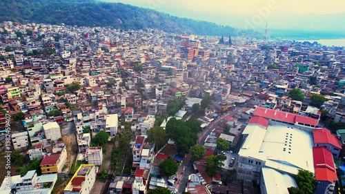 Aerial View of Santiago Atitlan, Guatemala. Town on Coast of Atitlan Lake, Buildings and Streets