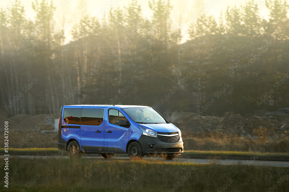 Delivery van on road with natural scenery
