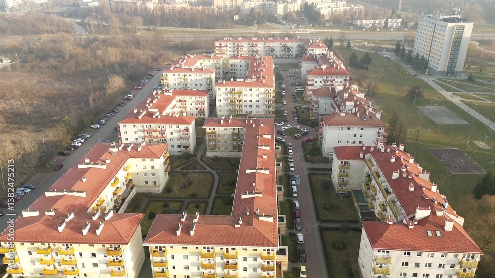 Modern apartment buildings with balconies and parking spaces