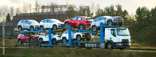 Quadro su tela Highway car transportation of SUVs