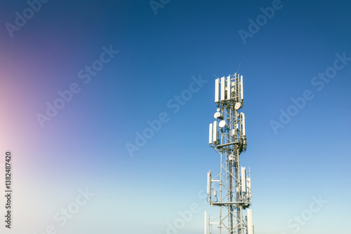 Obraz na płótnie Cellular antenna in rural environment, clear sky w salonie