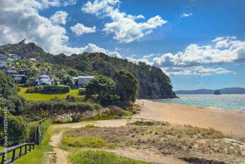 Hahei, Coromandel Peninsula, New Zealand. Houses overlooking beach and Pacific Ocean.