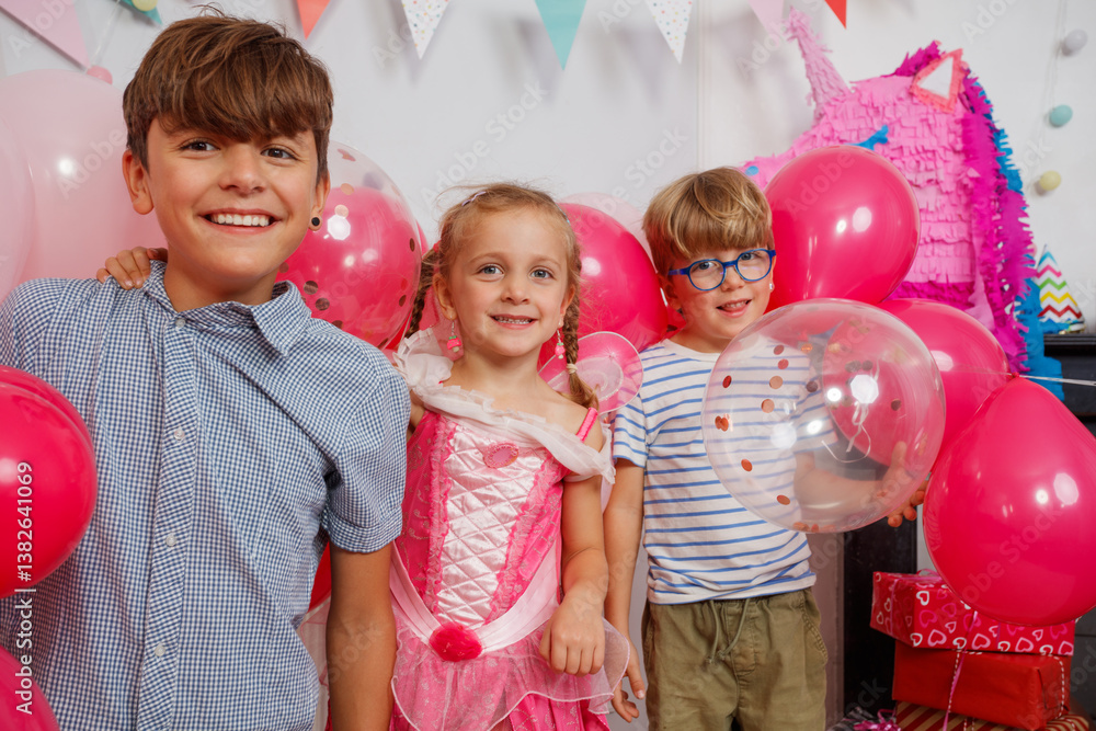Joyful kids enjoying a festive day with balloons and laughter