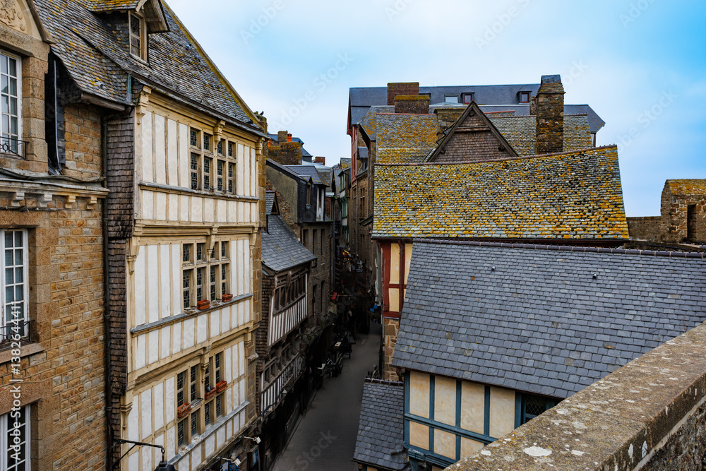 Rustic, old-town buildings with slate-covered rooftops