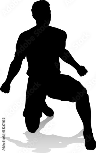 A soccer or football player male silhouette man