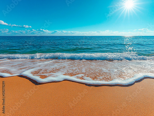 A serene sandy beach meets the turquoise sea under a clear blue sky. Soft waves lap the shore, creating a tranquil setting, perfect for relaxation and creative endeavors