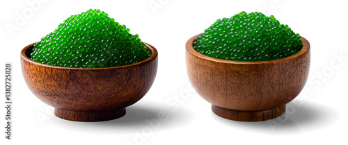 Wasabi tobiko fish roe in the small wooden bowl, Green fish roe in the wood bowl isolated background