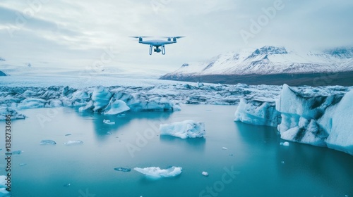 Obraz na płótnie Drone Flying Over Glacial Lagoon with Icebergs and Snowy Mountains w salonie