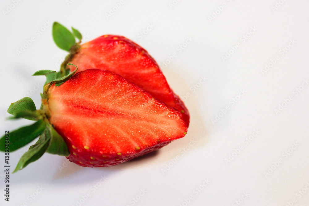 minimalistic photo of ripe and juicy strawberries on a white background minimalistic photo of ripe and juicy strawberries on a white background