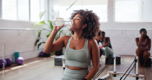 Fényképezés Drinking water, fitness and woman in gym, break and nutrition with liquid for wellness and hydration