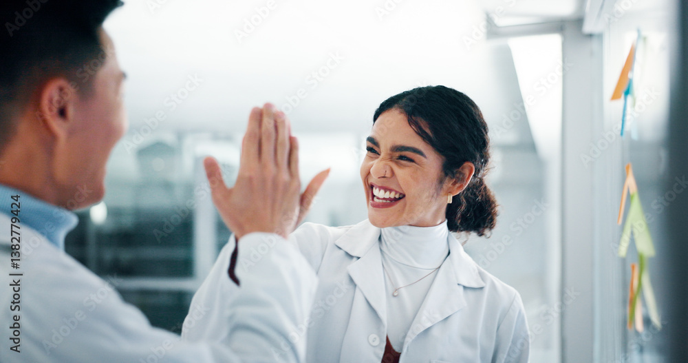 Lab, scientist and people with medical research, high five and colleagues with sticky notes or happy. Celebration, teamwork and employees with gesture for success, healthcare or achievement in clinic Lab, scientist and people with medical research, high five and colleagues with sticky notes or happy. Celebration, teamwork and employees with gesture for success, healthcare or achievement in clinic