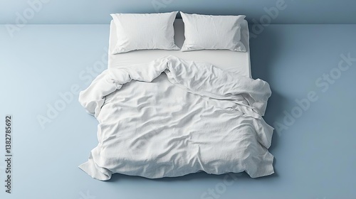 a top view of a bed with white sheets and pillows on a blue wall