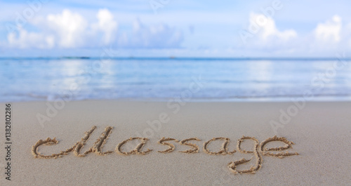 Word massage handwritten on the caribbean sand.