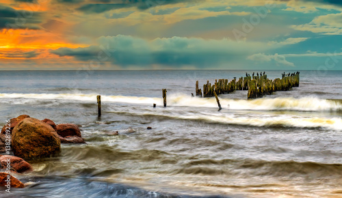Abandoned remains of old broken fishing pier, Baltic Sea