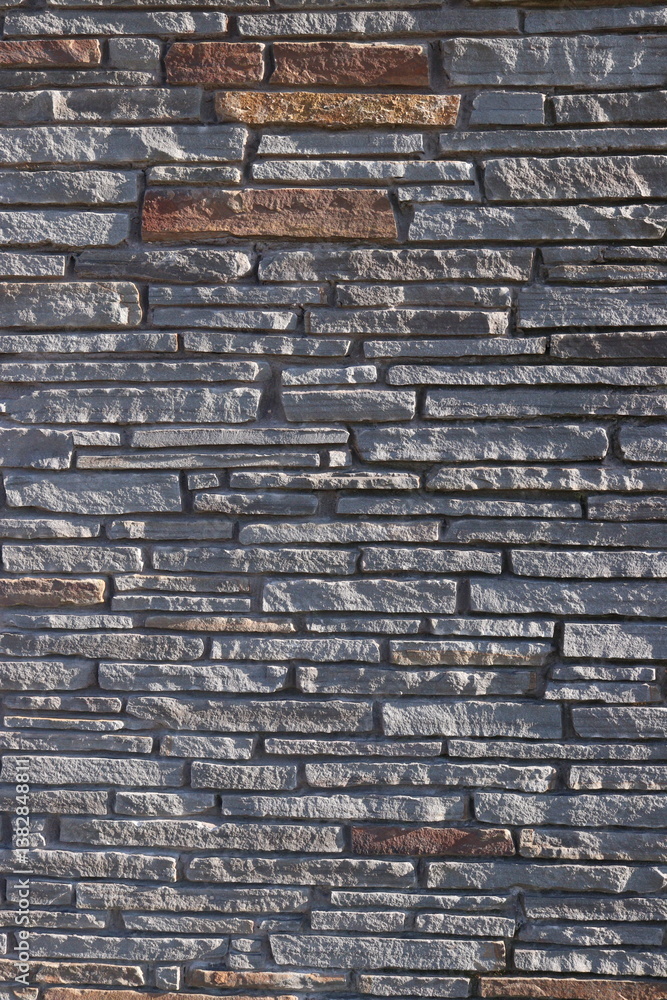Naklejka premium Stone Slate Walls Brickwork Slim Strip Rectangular Bricks uniform neat texture surface background