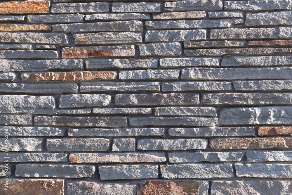 Naklejka premium Stone Slate Walls Brickwork Slim Strip Rectangular Bricks uniform neat texture surface background