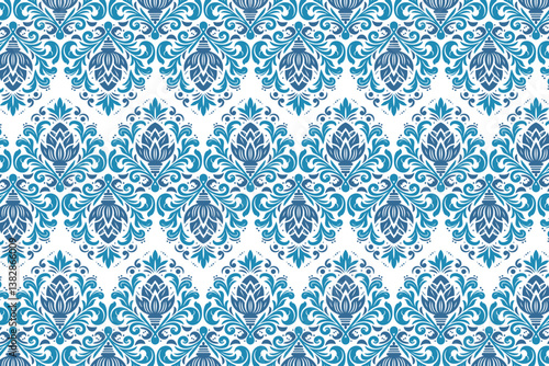 arabesque seamless blue ornamental pattern with artistic botanical flourishes for stylish table tops and home decor

