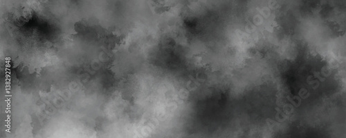 Organic and abstract grunge-style ink wash background in monochrome tones

